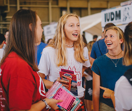 Students visit sponsor table at RecFest